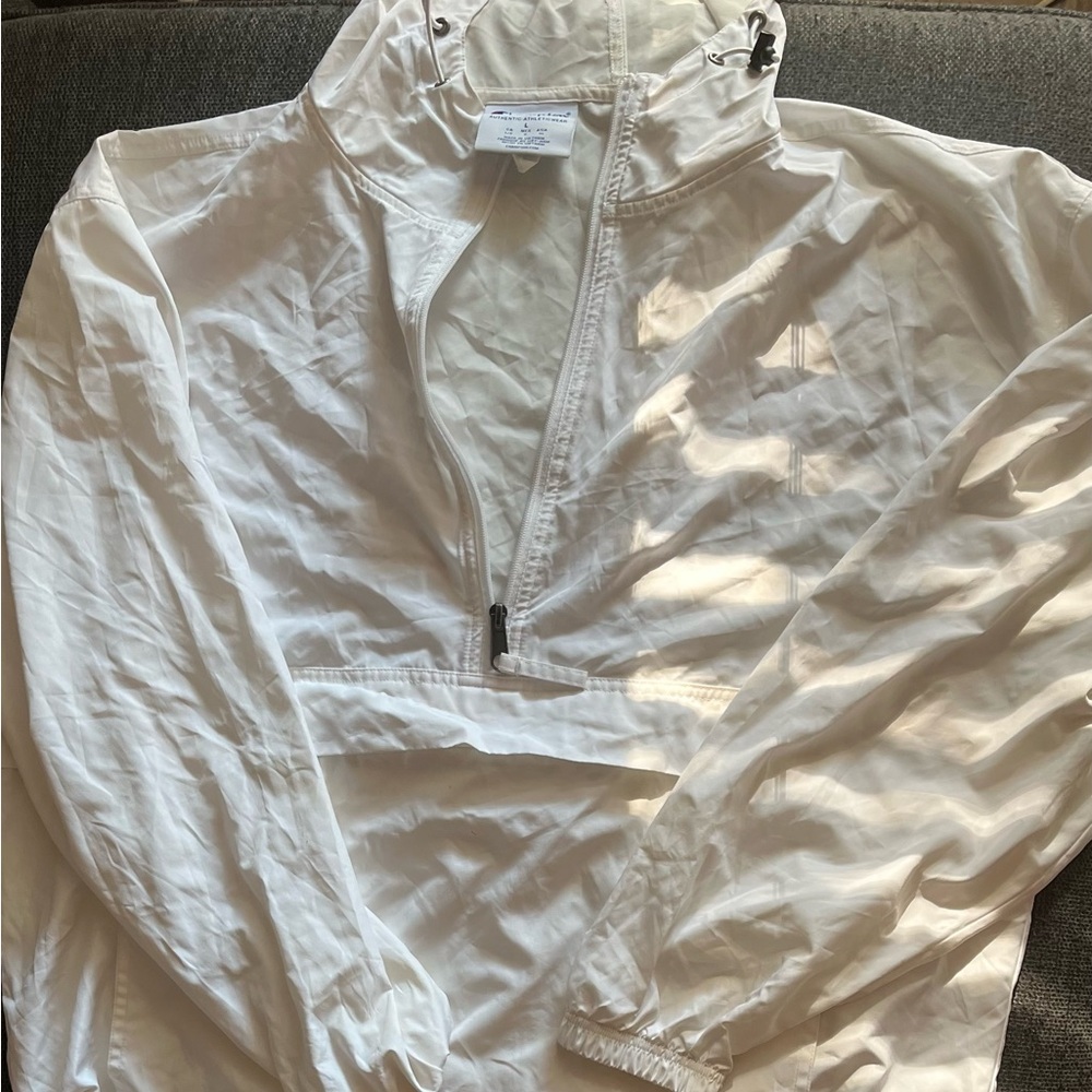 Champion White Windbreaker – Classic and Sporty
Size Large